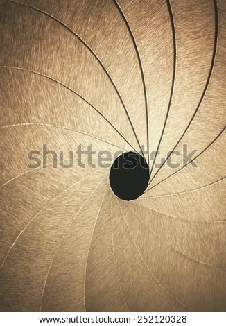 Stylized aperture blades exposed with depth of field in the hole.