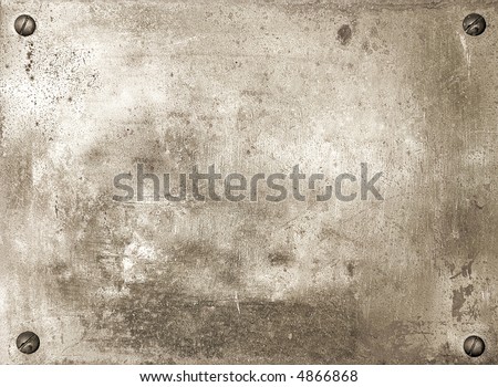 Brass shiny metal plate with screws background texture