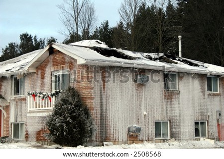 Winter house fire. The fire started in the back and moved quickly through the roof.