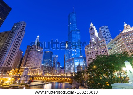 City of Chicago. Image of Chicago downtown and Chicago River with bridges at twilight.