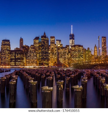 Manhattan Skyline with the One World Trade Center building at twilight, New York City