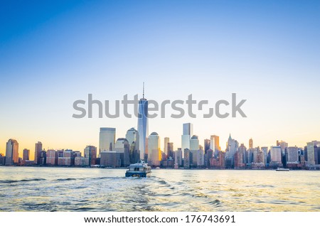 Skyline of lower Manhattan of New York City from Exchange Place at night with World Trade Center at full height of 1776 feet May 2013