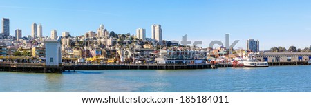 SAN FRANCISCO - MARCH 20: Tourists attraction  at famous Fisherman's Wharf on March 20, 2014 in San Francisco, California. The area's tourist attractions draw approximately 12 million visitors a year.