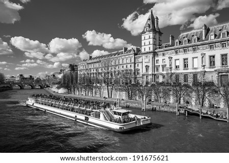 Boat tour on Seine river in Paris, France in black and white