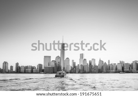 Skyline of lower Manhattan of New York City from Exchange Place at night with World Trade Center at full height of 1776 feet May 2013 in black and white