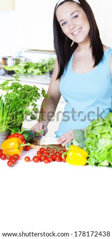 Young Woman Cooking. Healthy Food - Vegetable Salad. Diet. Dieting Concept. Healthy Lifestyle.