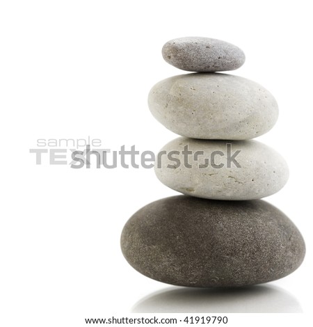 Stone tower with reflection on white background. With sample text