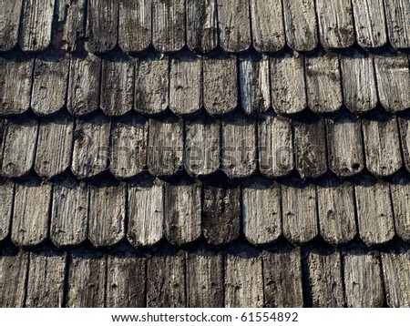 Roof made ??of wood. Close Up Wooden Tile Background