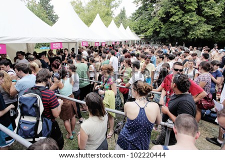 NOVI SAD, SERBIA - JULY 7, People infront of the Voucher - Tickets exchange tents at EXIT 2011 Music Festival, on July 7, 2011 in the Petrovaradin Fortress in Novi Sad.