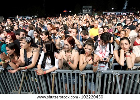 NOVI SAD, SERBIA - JULY 9: Audience infront of the Fusion Stage at EXIT 2011 Music Festival, during Mizar\'s performance on July 9, 2011 in the Petrovaradin  Fortress in Novi Sad.