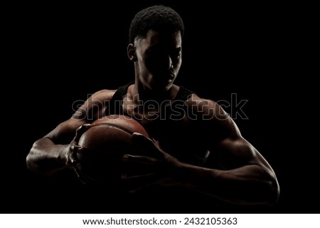 Image, Stock Photo Concentrated black man playing basketball on court