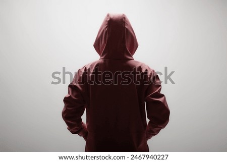 Similar – Image, Stock Photo A mysterious woman in light purple cardigan over blue and white patterned dress partially veils her arms crossed in front of her chest her face and dark hair with a mauve taupe colored scarf in front of rust and mint colored old walls