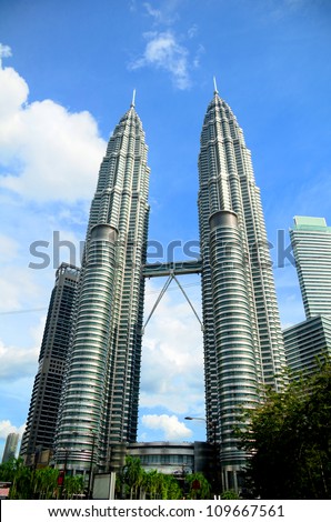 KUALA LUMPUR - MARCH 14: Petronas Twin Towers on March 14, 2012 in Kuala Lumpur. Petronas Twin Towers were the tallest buildings in the world from 1998 to 2004, but remain the tallest twin buildings