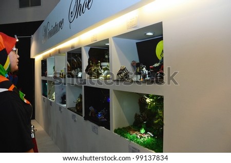 KUALA LUMPUR, MALAYSIA - MARCH 30: Minature Shoe Gallery created by student competition on display at Malaysia International Shoe Festival 2012 Putra World Trade Centre March 30, 2010 in Kuala Lumpur