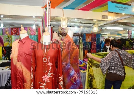 KUALA LUMPUR, MALAYSIA - MARCH 30: Exhibition batik by traders during National Craft Day 2012 at the Kuala Lumpur Craft Complex on March 30, 2012 in Kuala Lumpur, Malaysia