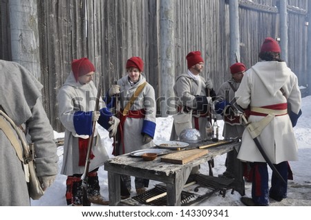 WINNIPEG, MB - FEBRUARY 24: Historic soldiers from the 2012 Festival du Voyageur, Winnipeg\'s winter festival celebrating the French Canadian culture. February 24, 2013 in Winnipeg, Manitoba
