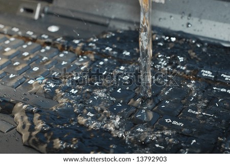 water spilled on computer