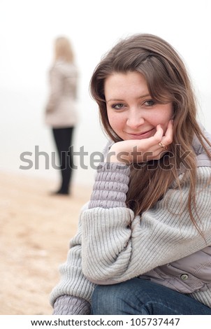 young girl in anticipation of the meeting with a friend