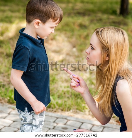 The woman is engaged in raising a child diligently informing how needed and he can not to do