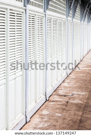 White wooden wall of the royal palace in Thailand.