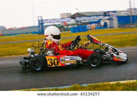 BUCHAREST, ROMANIA - SEPT. 25: Oprea Andrei competing in National Karting Championship on September 25, 2010 in Bucharest, Romania.