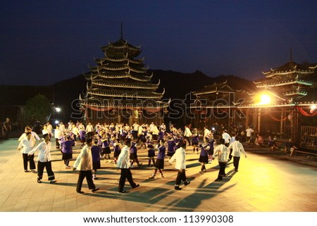 GUANGXI, CHINA - SEPTEMBER 17 : Unidentified minority dancers perform local dance called \