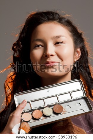 Asian woman in a beauty salon.