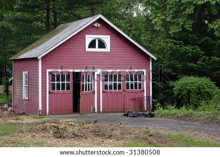 Red garage and driveway