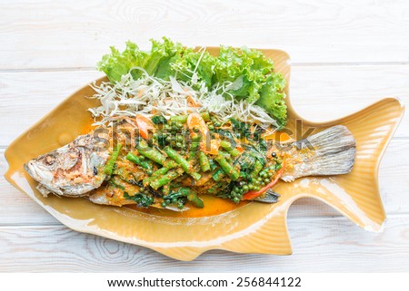 Top view, Thai Food - Spicy Sea Bass Soupsteamed, Thai style steamed fish in spicy sauce