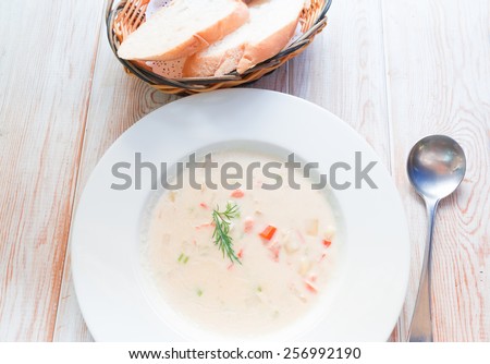 salmon soup served with bread