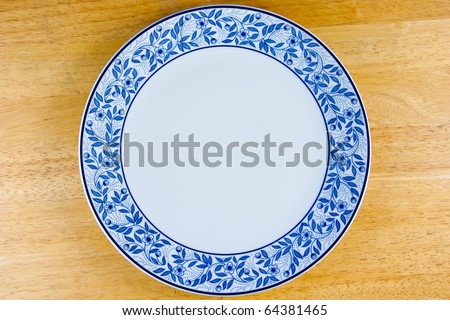 empty Asia plate on wood wall