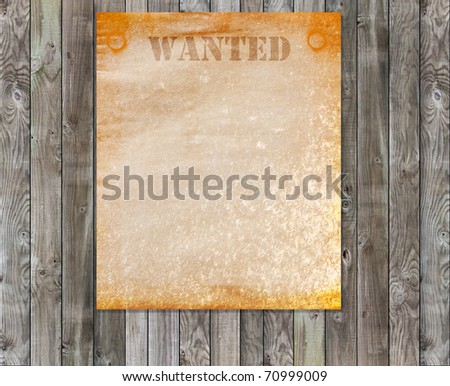 Wanted poster on wood panels