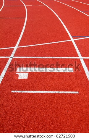 Number 1 on the start of a running track