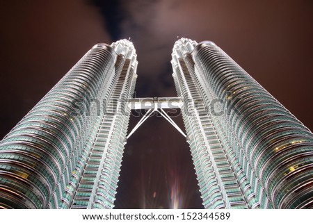 KUALA LUMPUR - FEBRUARY 12: The Petronas Twin Towers are the  world\'s tallest twin towers. The skyscraper height is 451.9m. February 12,  2012, in Kuala Lumpur, Malaysia