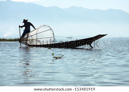 Intha people possess the leg-rowing style and the unique coop-like fishing equipment