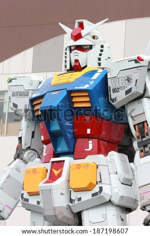 TOKYO, JAPAN - OCTOBER 26: Gundam Mobile Suit Replica on Oct 26,  2013. The 1/1 scale 18m tall statue was built as part of the 30th  anniversary of the Gundam series.