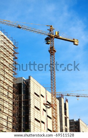crane building construction with blue sky background
