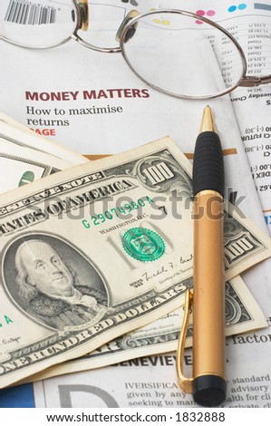 Money Market analysis, calculator, horizontal orientation. closeup, cash, headlines, glasses