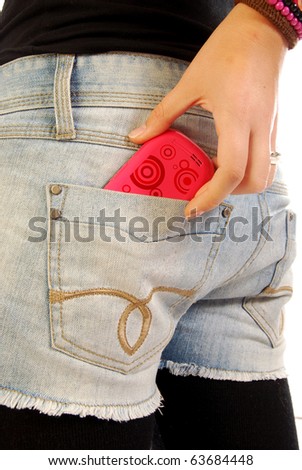 A young girl in hot pants takes the phone from the pockets of jeans