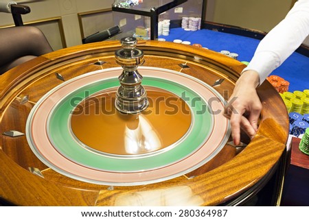 Spinning fortune roulette wheel in casino