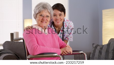 Asian nurse smiling with Elderly patient