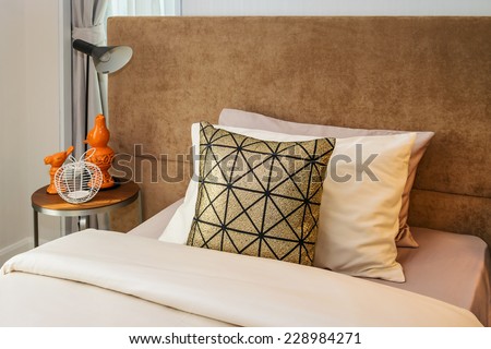single bed with bedside tables and reading lamp
