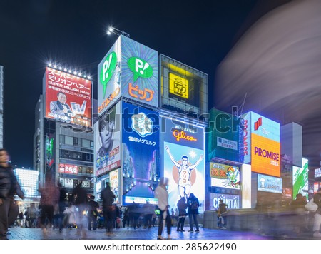 Osaka, Japan - April 09, 2015: The Glico Man light billboard and other light displays at Dontonbori, Namba area, Osaka. Namba is well known as an entertainment and shopping area in Osaka.