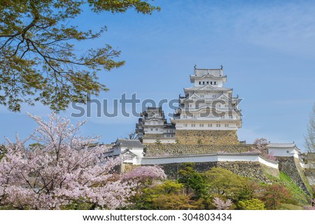 Himeji Castle with cherry blossom in spring. Himiji castle is landmark and one of the main tourist attraction in Japan.