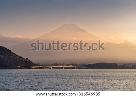 Lake kawaguchiko and Mountain Fuji with clouds in sunset