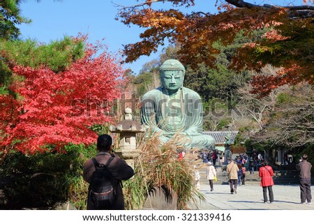 Kamakura, Japan - December 5, 2013: Daibutsu, People came to pray the bronze statue of Amitabha Buddha located at the Kotokuin Temple in Kamakura, Japan in Autumn season