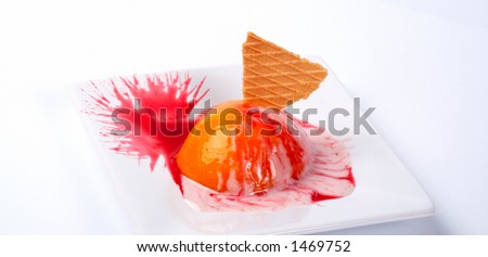 Dessert with peach, cracker and cream, on white background