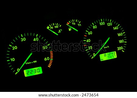 The green neon car dashboard over a black background