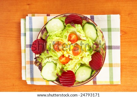 Mediterranean salad with lettuce tomatoes cucumber and beet