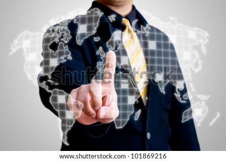 Business man touching on world map on virtual screen